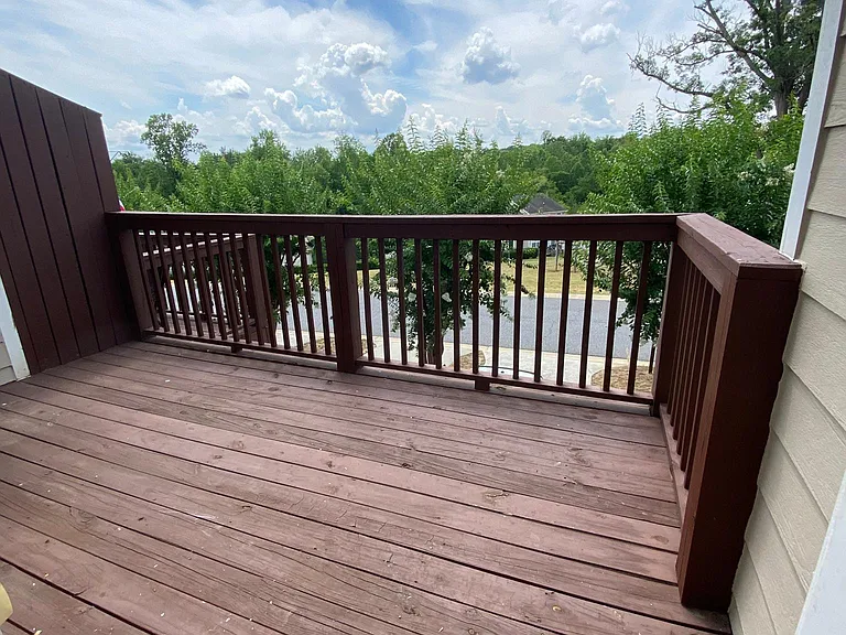 This is one of 2 decks! This deck is right off of the family room. Get out in the morning and enjoy that cup of coffee!