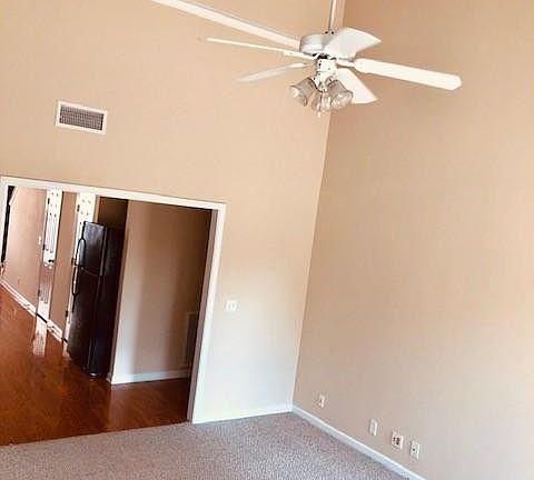 Living room with vaulted ceilings