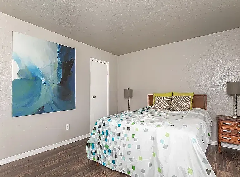 Bedroom with Bed and Wall Art
