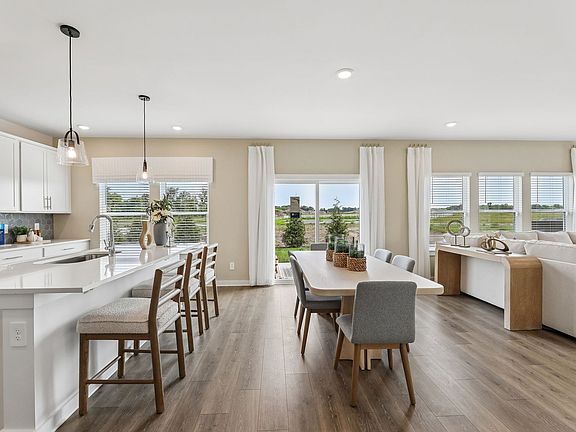 The open-concept floorplan allows for an easy flow between the kitchen and dining areas.
