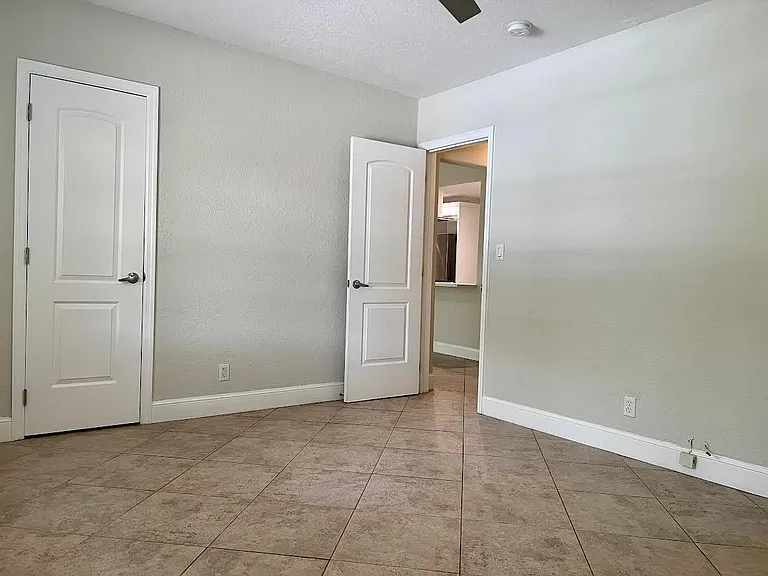Large bedroom with 2 spacious closets. 13' x 11'