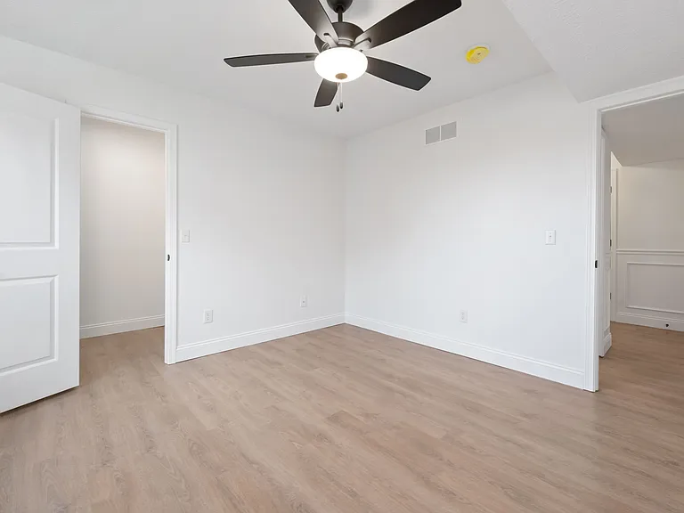 Envision your dream space in this modern bedroom with sleek wooden flooring. Envision your dream space in this modern bedroom with sleek wooden flooring.
