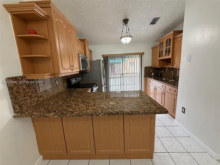 7792 W 29th Way #202 — Photo 2