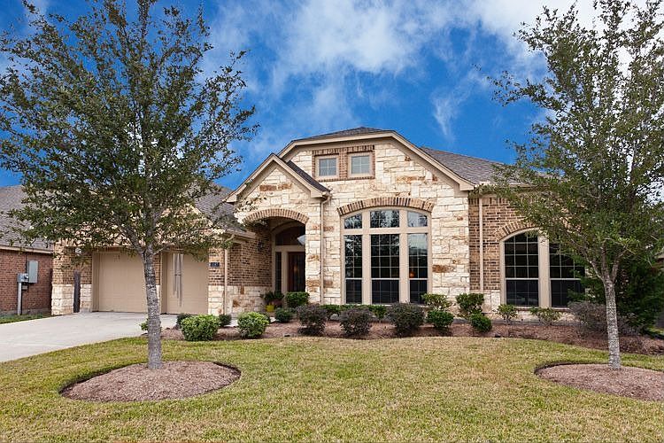 Welcome Home to 1187 Rustling Wind in prestigious South Shore Harbour!