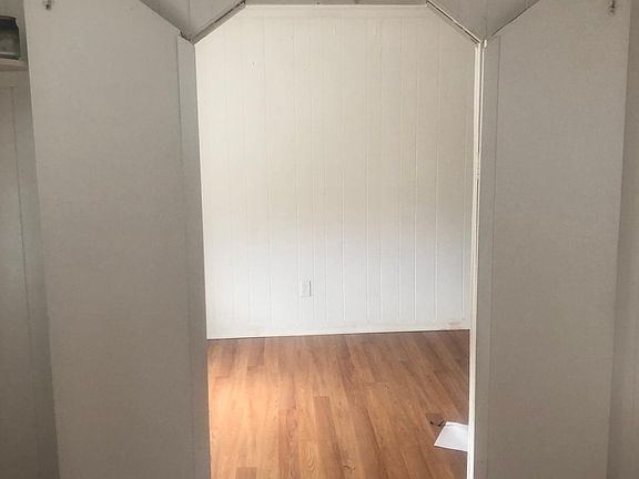 Living room looking into bedroom