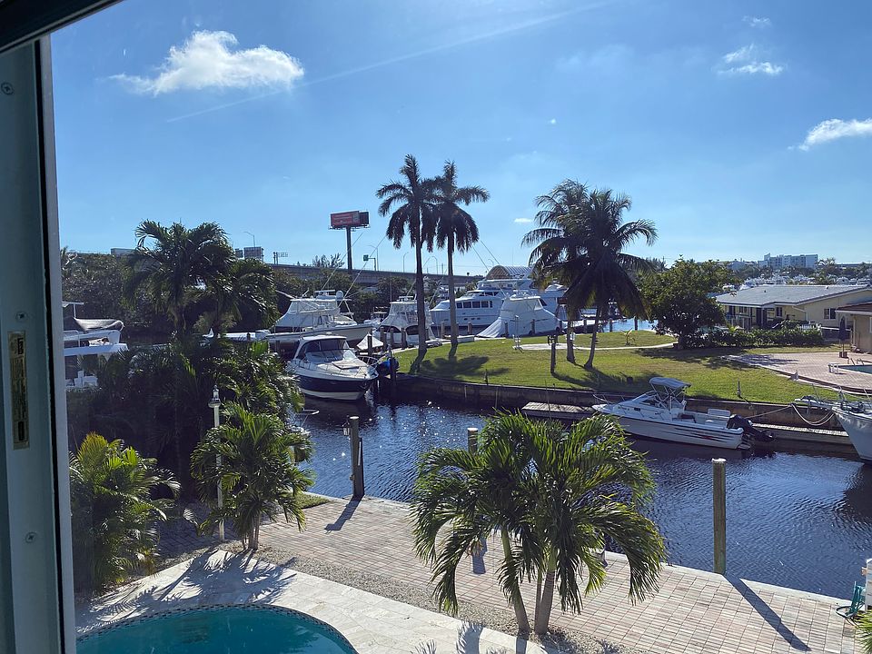 View from master bedroom stand up desk, superyacht is passing by in the turning basin.