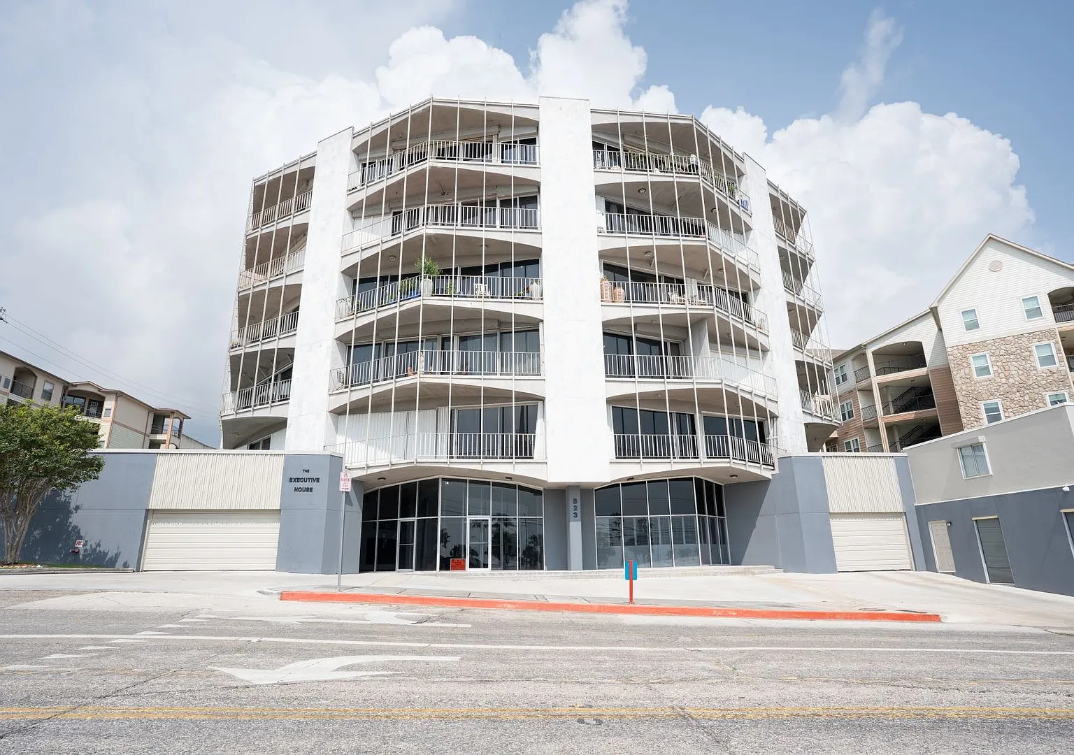 Sprawling 5th-Floor Corner Condo Just Steps from McGee Beach — Photo 1