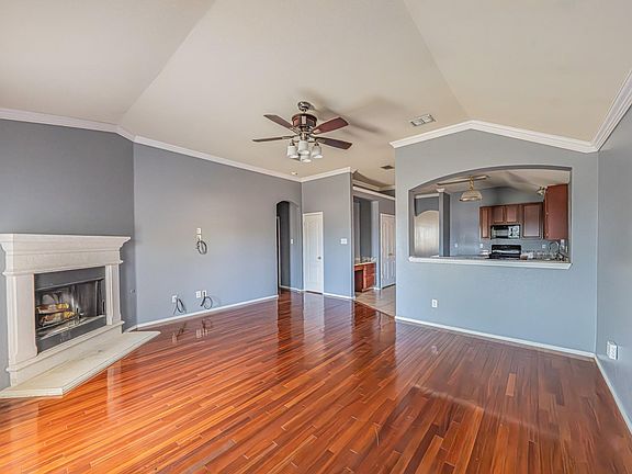 Living area 2 with fireplace next to the kitchen