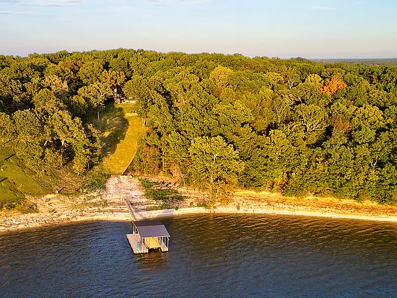 View of dock & yard to house