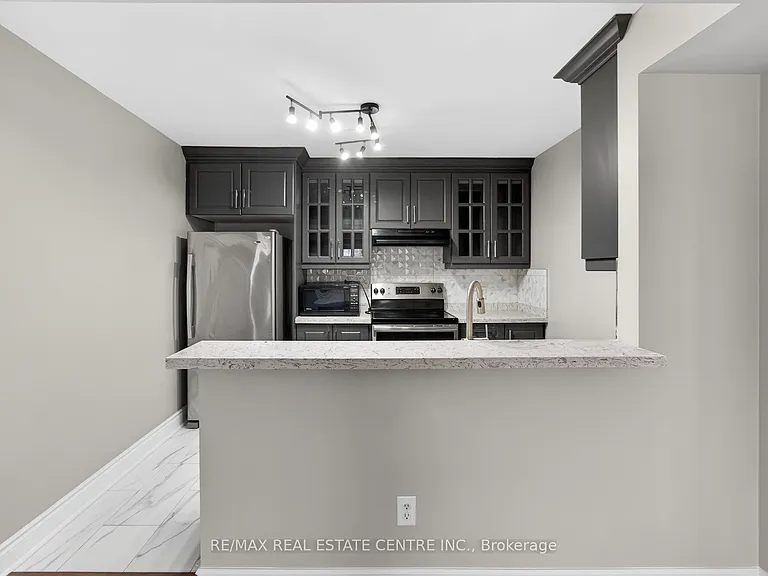 5035 Oscar Peterson Blvd #105 — Photo 38