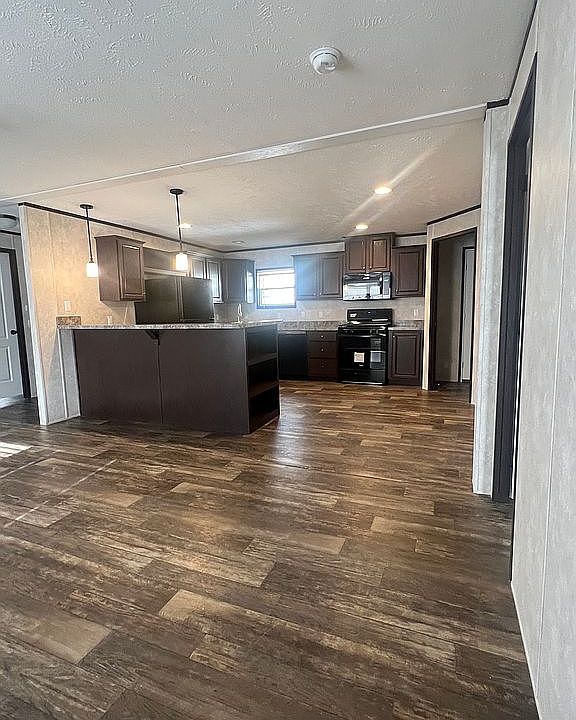 1st image of 534 E 37th Ave Lot 107