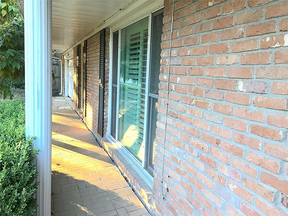 View of front porch. Notice the large double-paned windows!
