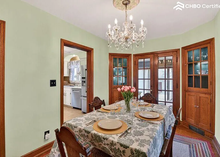 Dining table can expand to seat six.