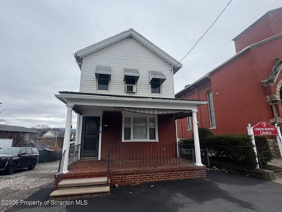 1st image of 209 S Main Ave