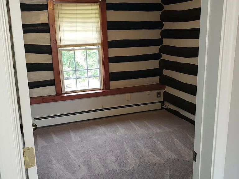 2nd bedroom with new carpeting.