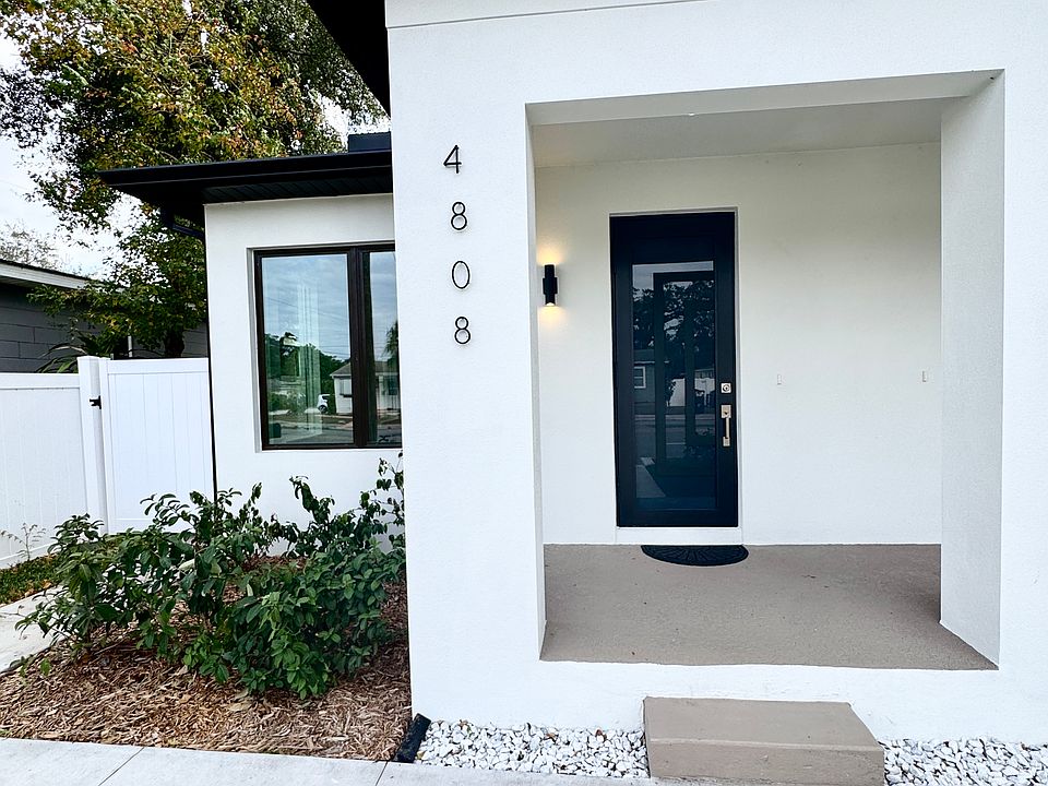 The unit features its own street address (no apartment/suite number) and mailbox. Yard is maintained by the owner.