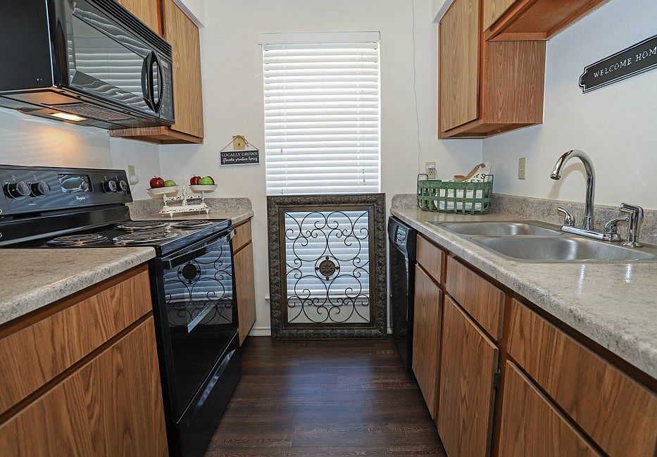 Well-designed kitchen featuring generous counter space and efficient layout for everyday convenience