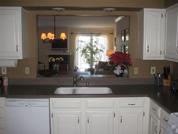 Kitchen with pass-through to dining/living room