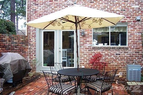 Prvate courtyard is perfect for grilling, gardening, and entertaining
