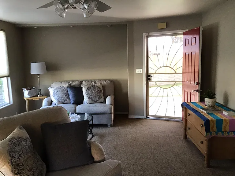 Living room with large screen smart television