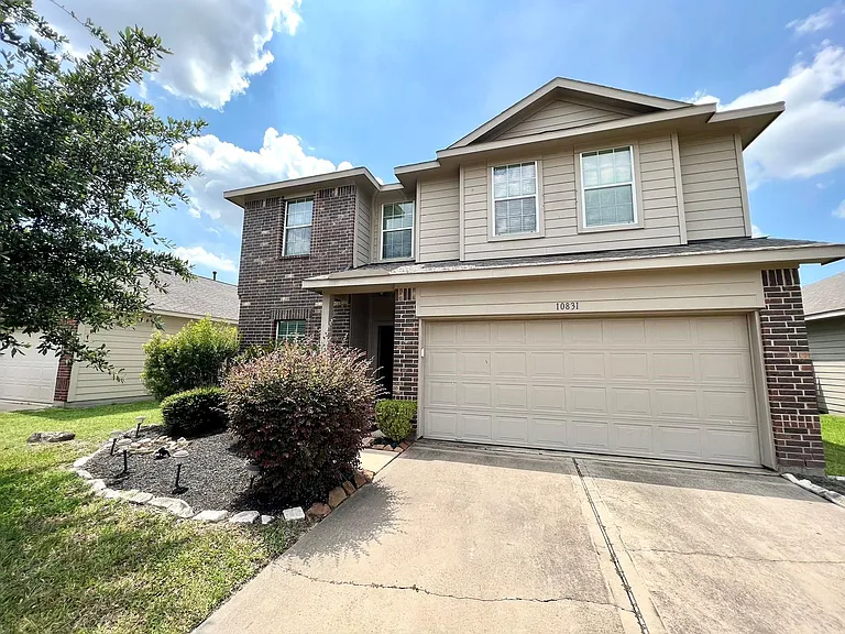 10831 Woodwind Shadows Dr — Photo 1