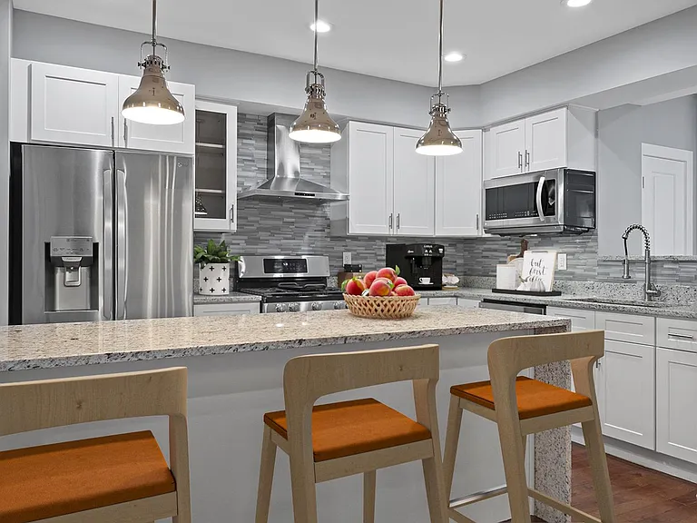This image shows a virtually furnished space. This space comes unfurnished but can come beautifully furnished by our in-house design team for an additional fee.