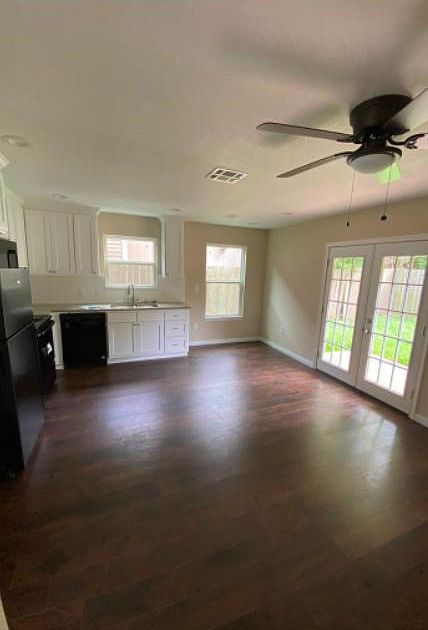 Kitchen and Living Room. Back patio door