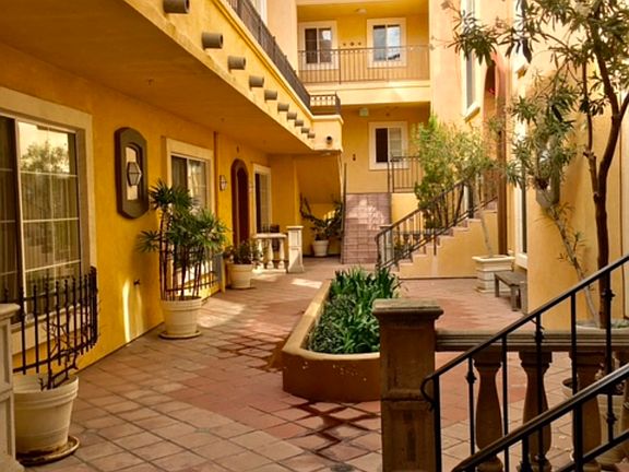 Open landscaped courtyard with Saltillo tiles