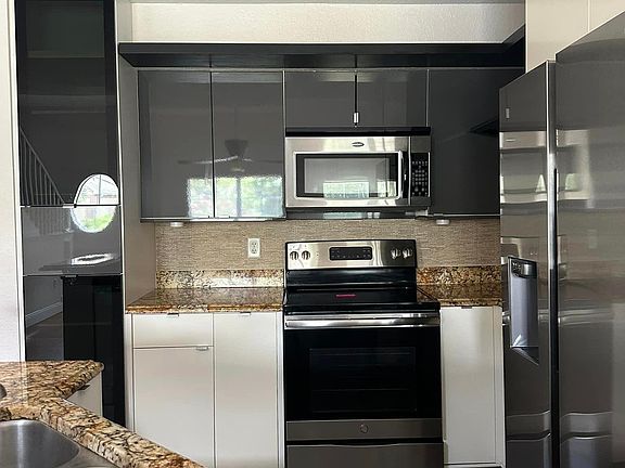 Another view of the kitchen - new refrigerator