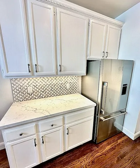 Unit #504 kitchen with TONS of counterspace and top of the line Fisher & Paykel refrigerator with water/ice!