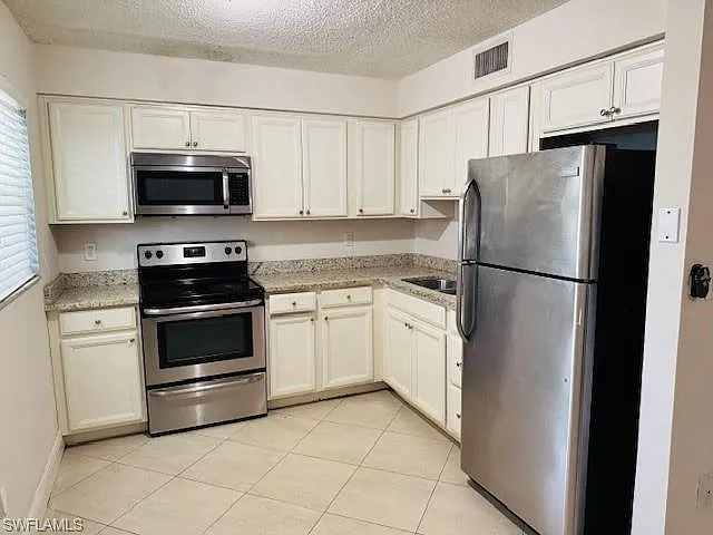 Building Photo - 3325 Airport Rd N #J3