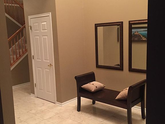 front entrance, 18ft ceiling