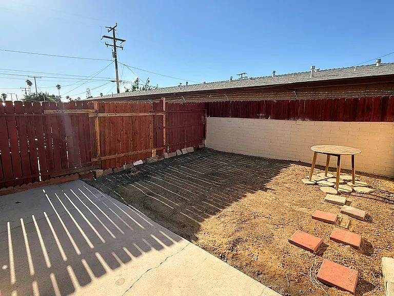 private backyard (we are currently working on landscaping that should be done before move in)