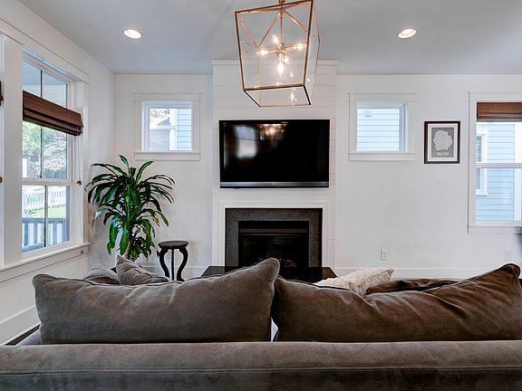 Lots of natural light in the living areas with modern fixtures.