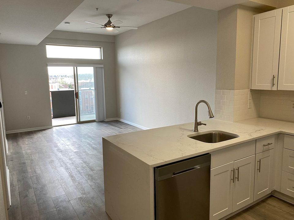 Quartz counter tops w/ waterfall end.