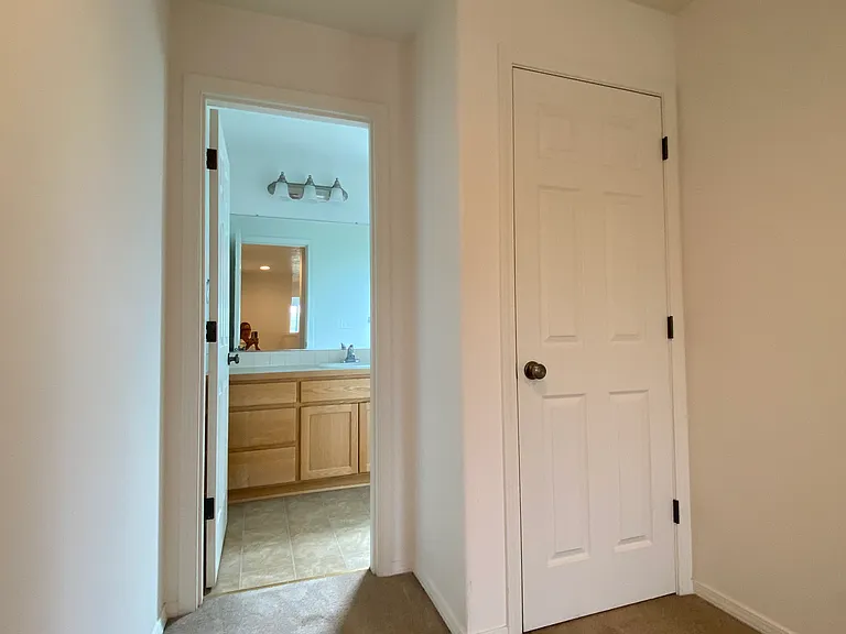 Second level. Linen closet and full bath entrance.