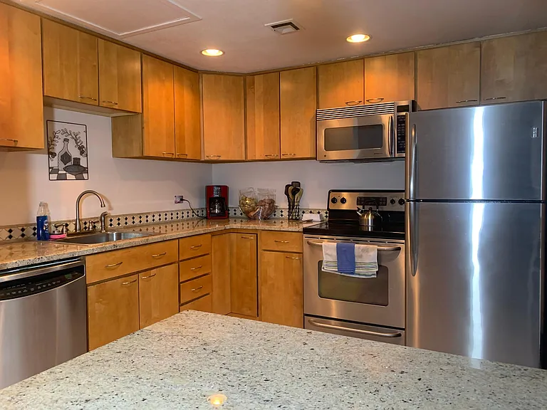 Full view of the kitchen from the dining area.