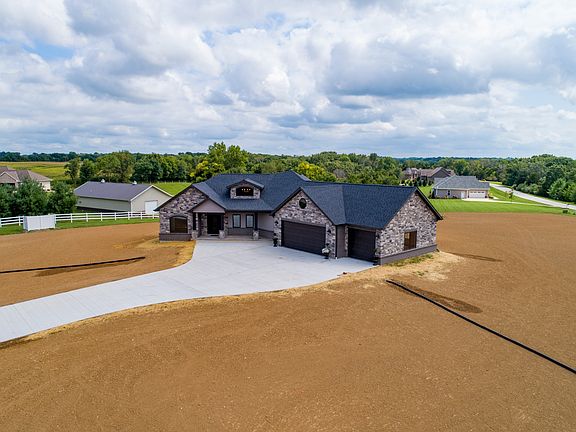 Full stone and brick on garage end