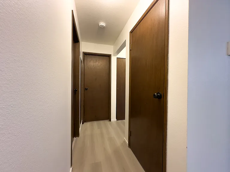 Hallway with 2 closets