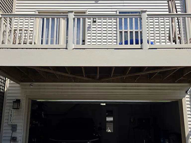 2 car garage with space in the driveway for another 2 cars.
