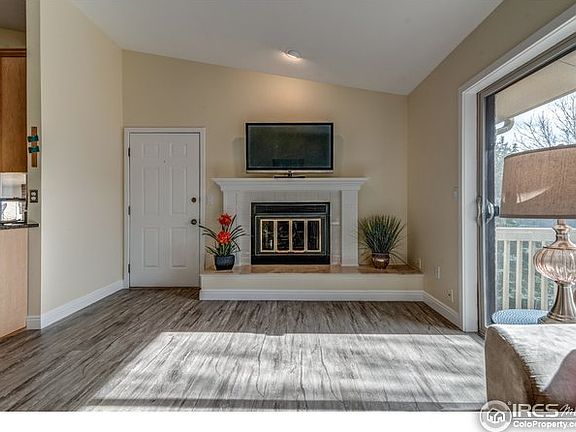 Fire burning with Travertine hearth