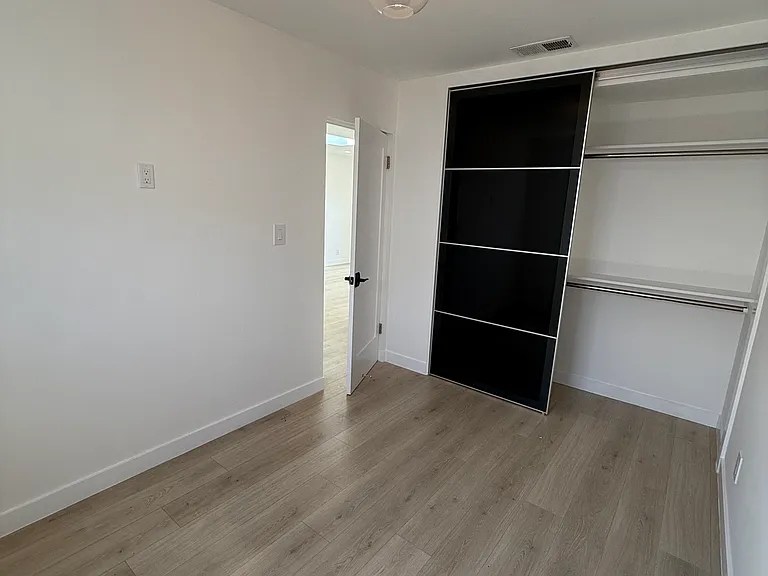 guest bedroom/office looking towards closet