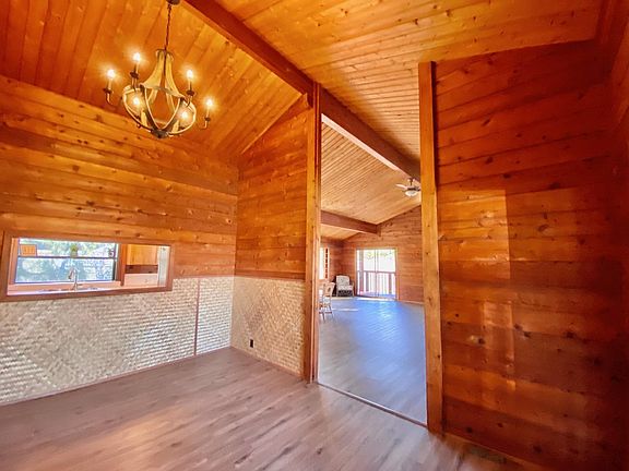 Once inside the large foyer room you will see the large open floor plan living/dining to the right.