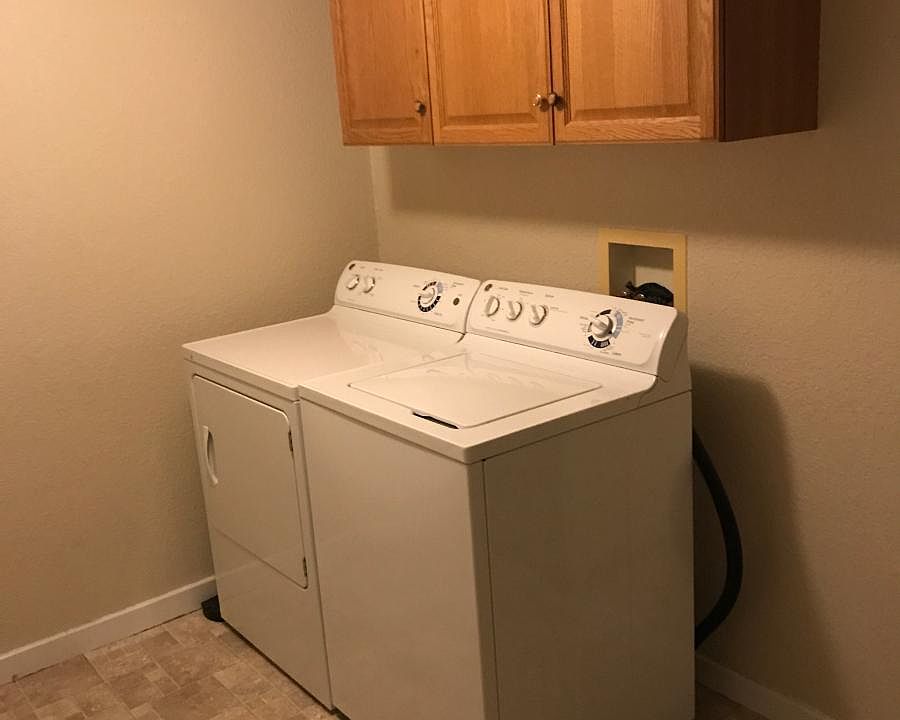 Laundry room with washer and dryer