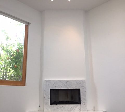 Marble Fireplace with 15 foot wall