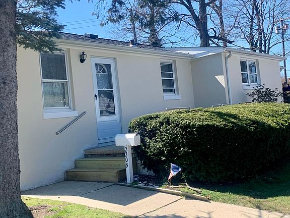 Patio and large front yard. BBQ grill as well in backyard