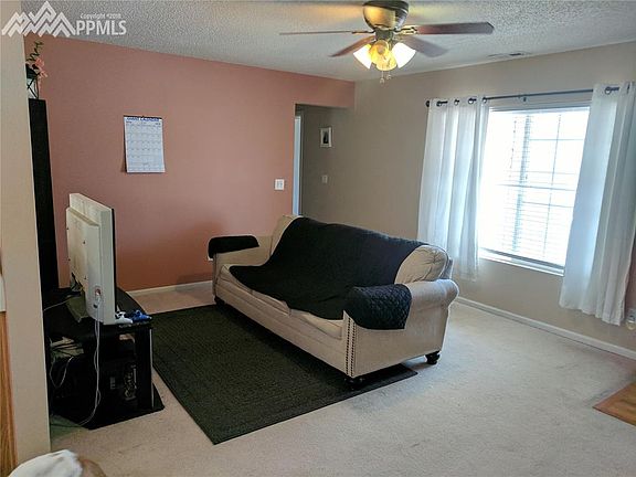 Large living room, bright and open.