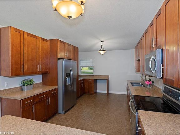 4th image of 6808 Woodgrain Ct