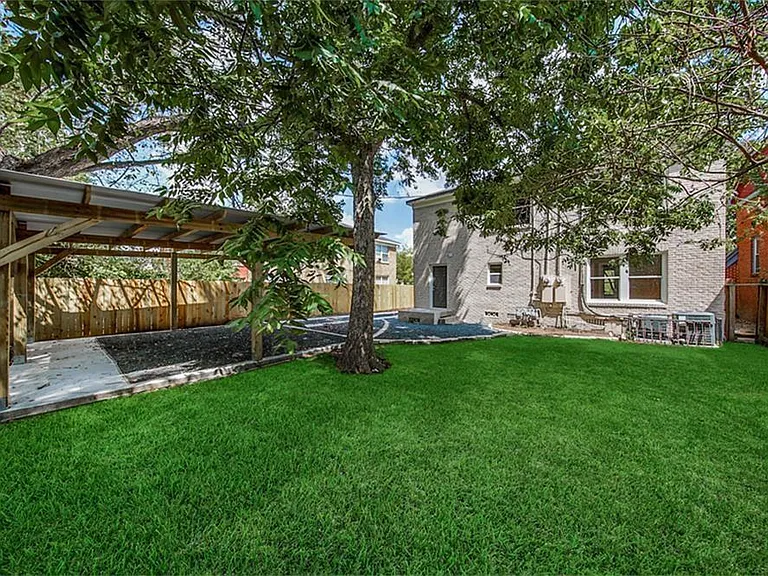 The backyard now has a dedicated third parking spot as well as storage shed.