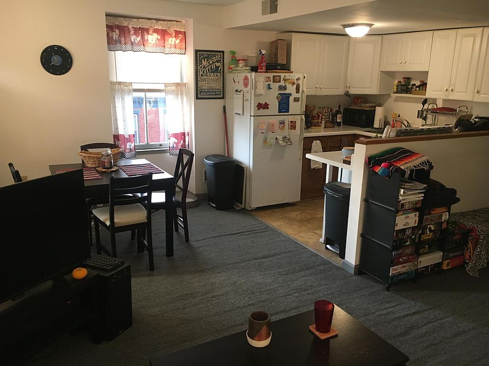 View. of open plan kitchen, dining, living room.